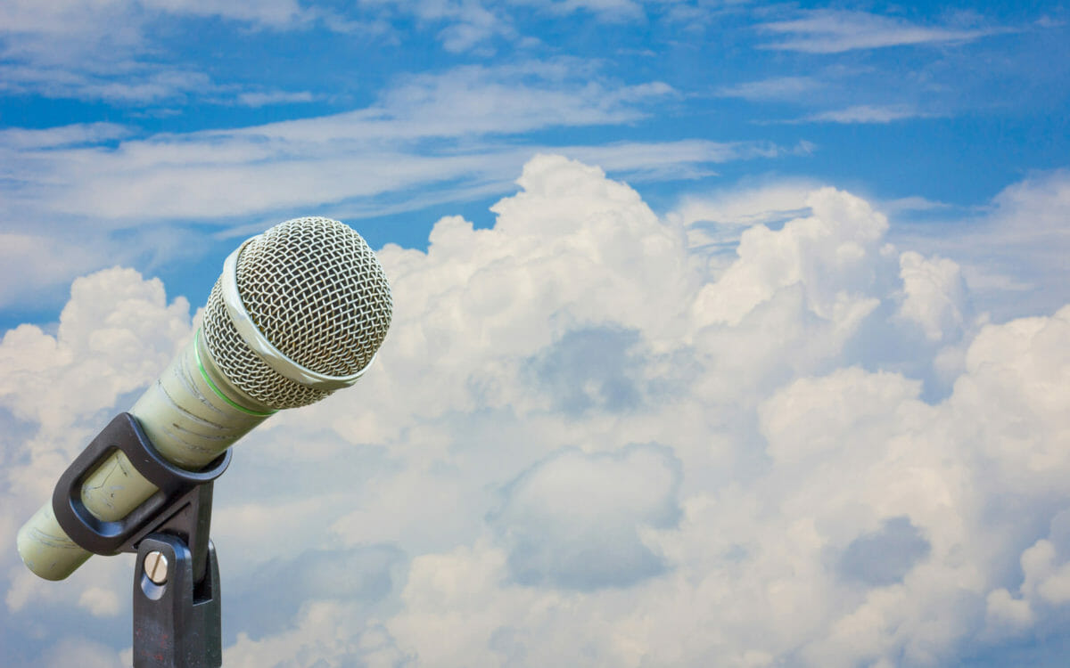 microphone with sky and clouds background